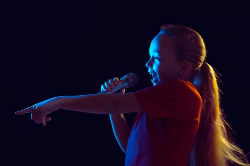 little-girl-with-microphone-neon-light
